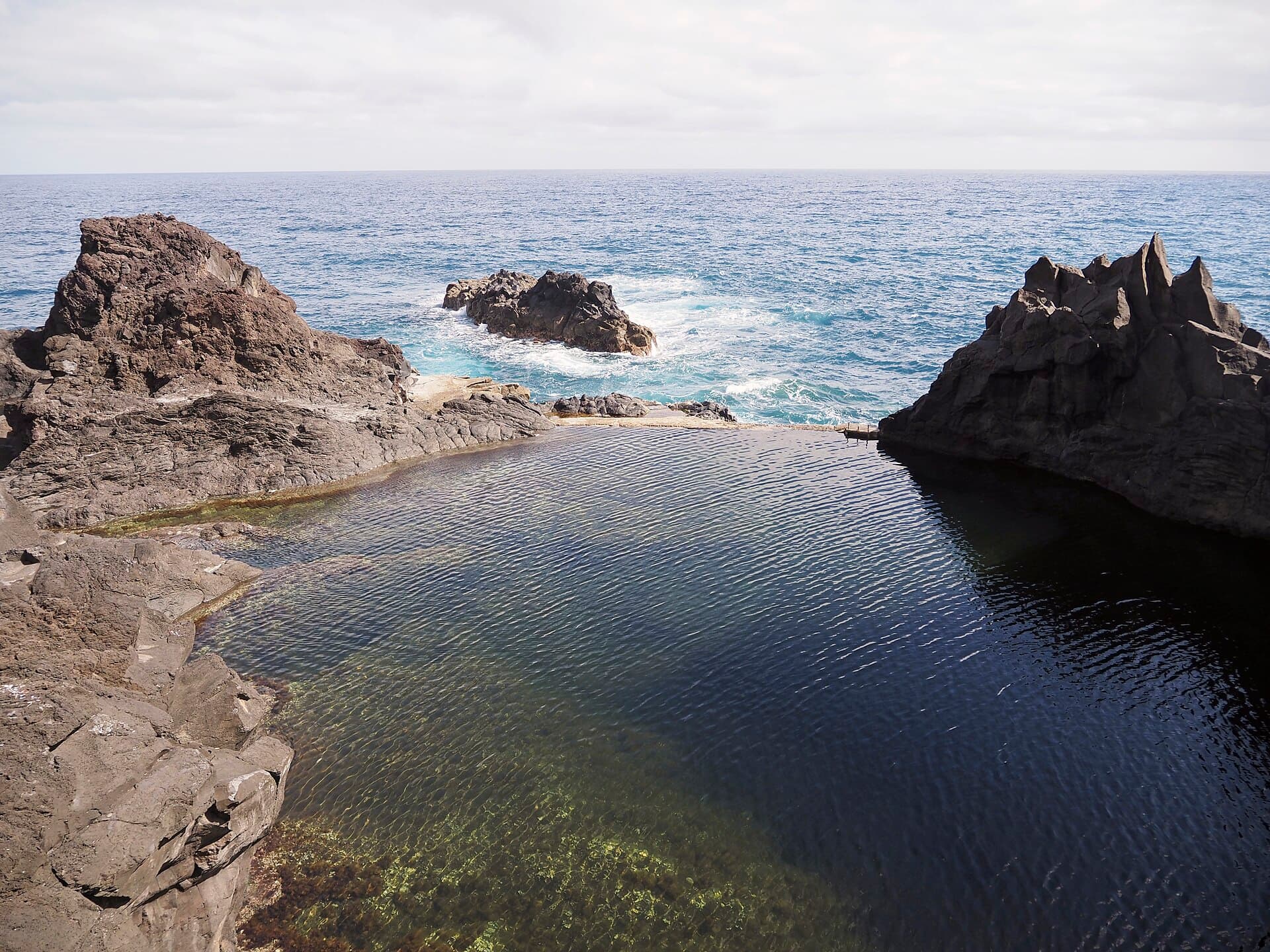 Porto Moniz volcanic pools — photo by Bex Walton from London, England, CC BY 2.0, via Wikimedia Commons