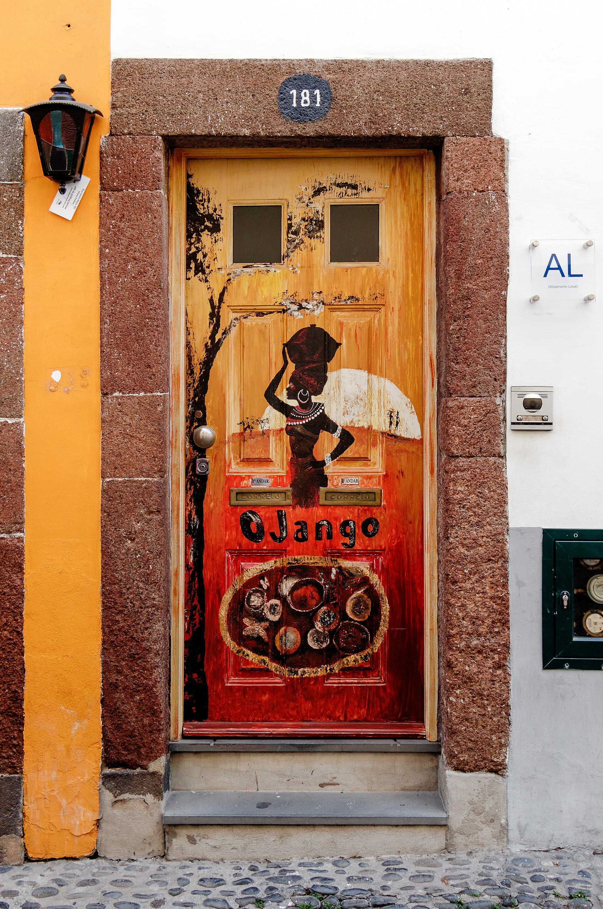 Painted doors of the old town — photo by H. Zell, CC BY-SA 3.0, via Wikimedia Commons