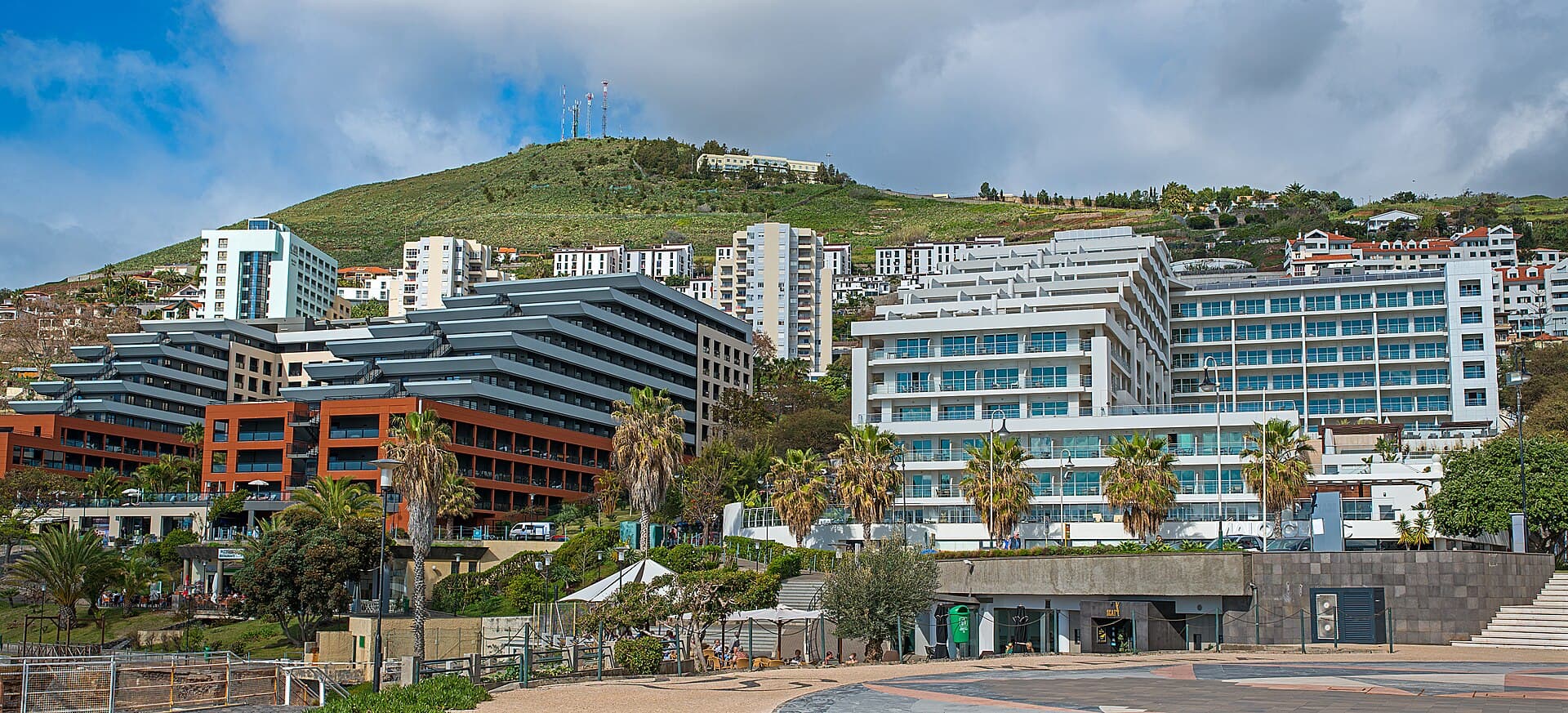 Funchal hotel zone and coast — photo by Bengt Nyman, CC BY 2.0, via Wikimedia Commons